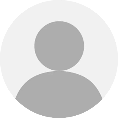 Gray silhouette of a person on a white circular background, typically used as a placeholder for a profile picture.